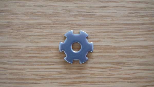 Cogwheel which adjusts grind size. There are 6 tooth on it.